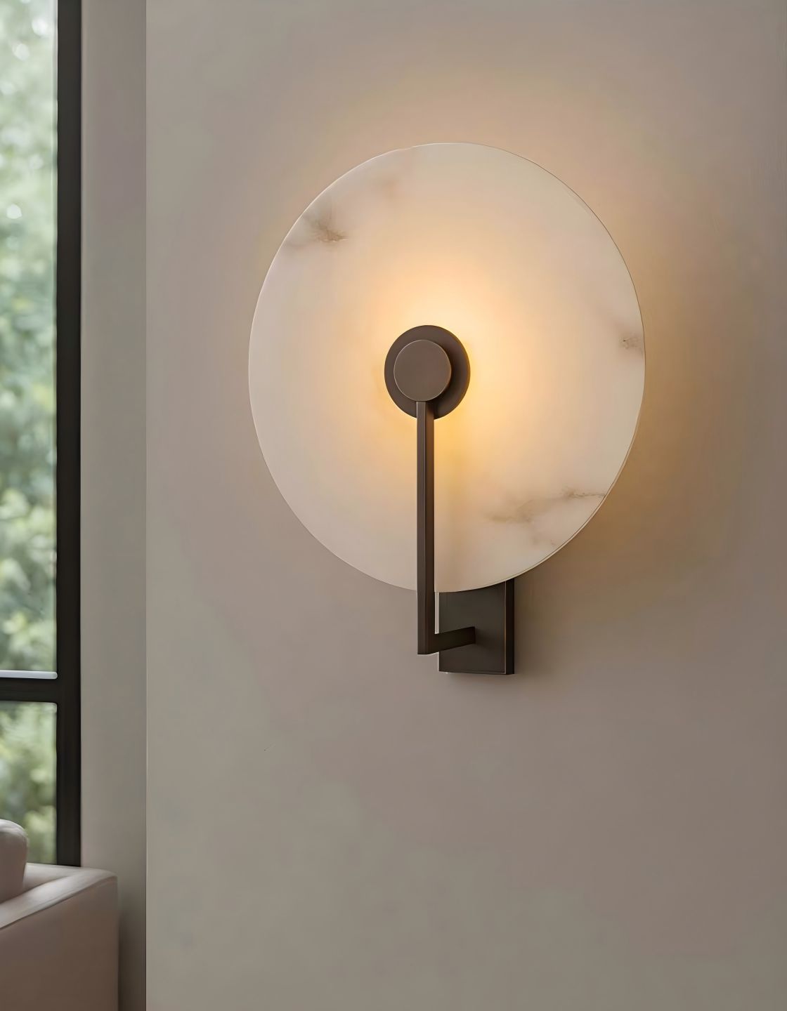 Round white marble wall light with dark bronze metal fixture, modern alabaster wall sconce for hallway lighting