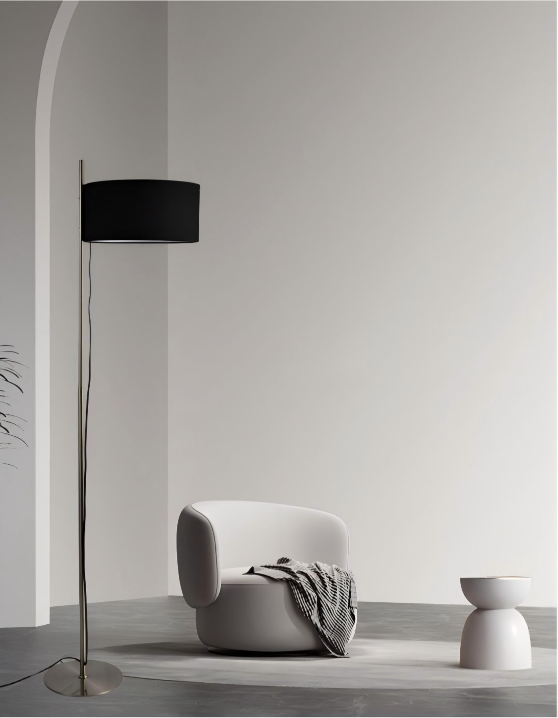 Modern black shade floor lamp with nickel finish, showcased in a minimalist living room with neutral decor