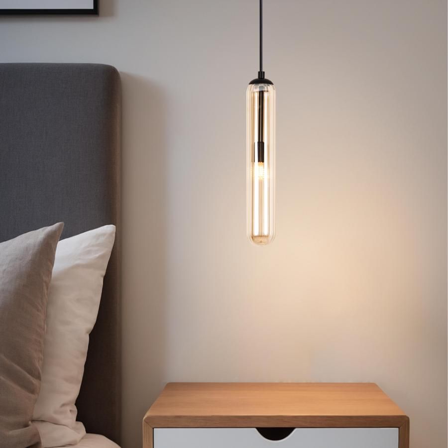 amber glass cylinder pendant lamp with black metal base, designed for bedroom bedside lighting,